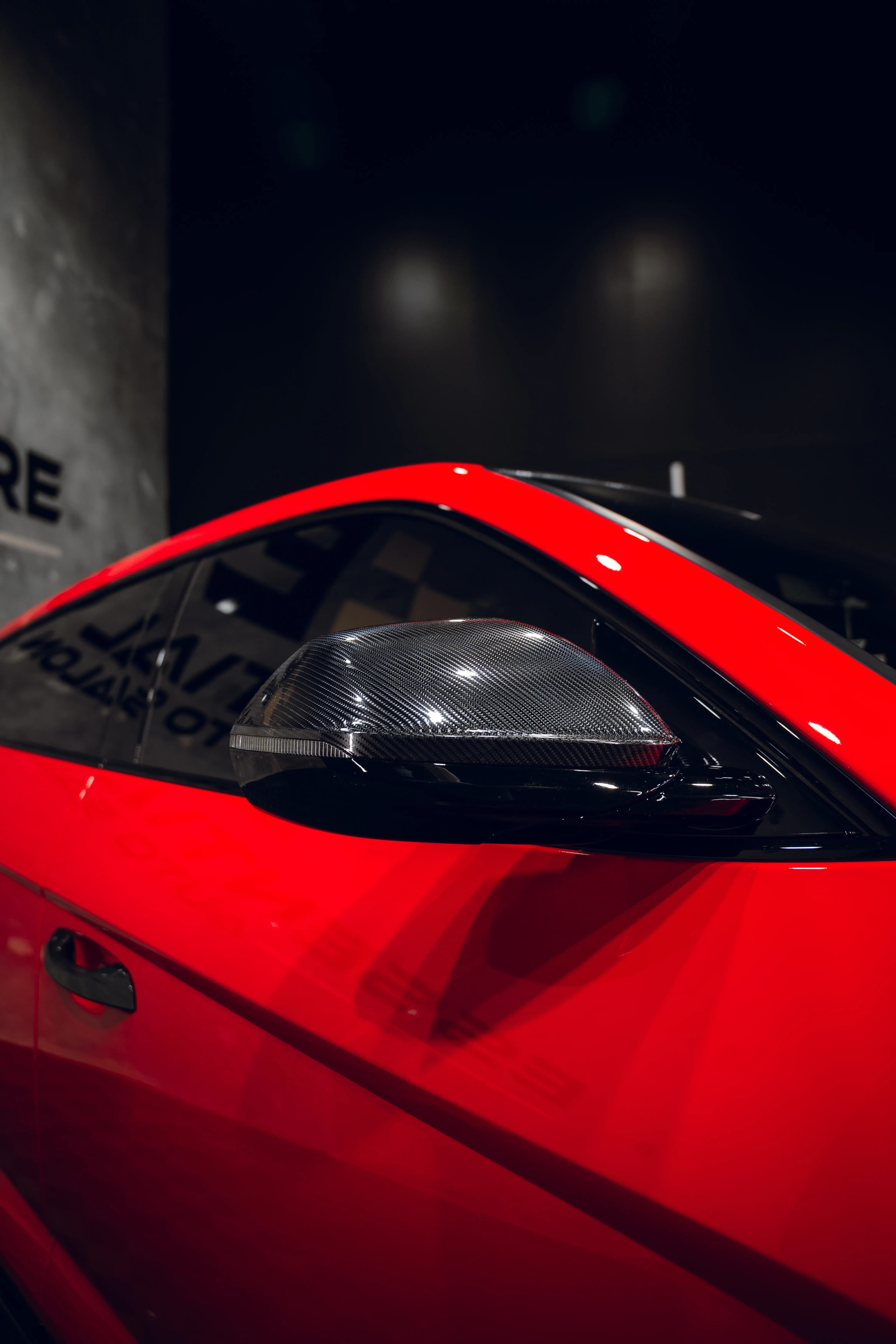 Deep gloss finish from ceramic coating on a red Lamborghini