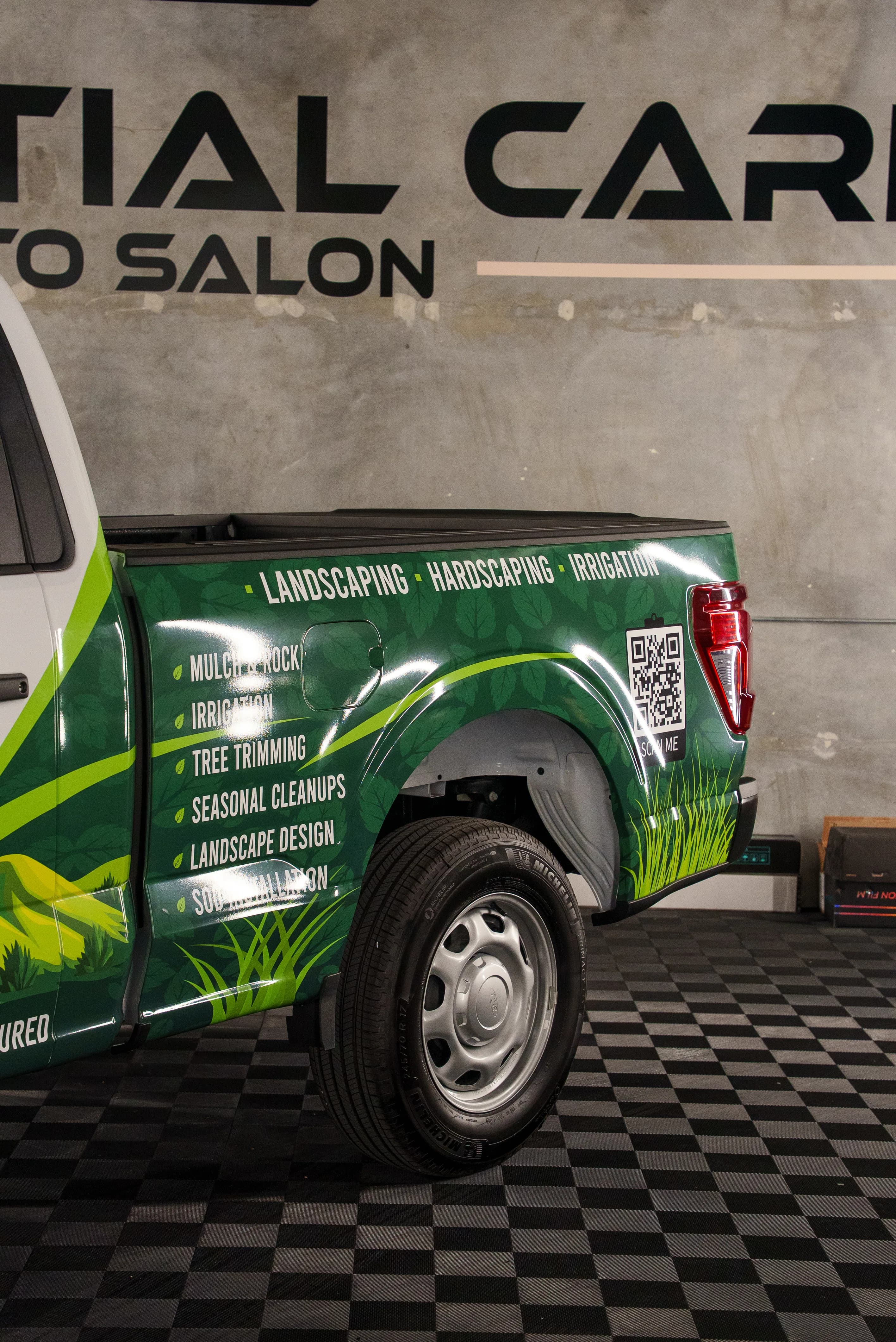 Tierra Landscaping truck bed with services and graphics