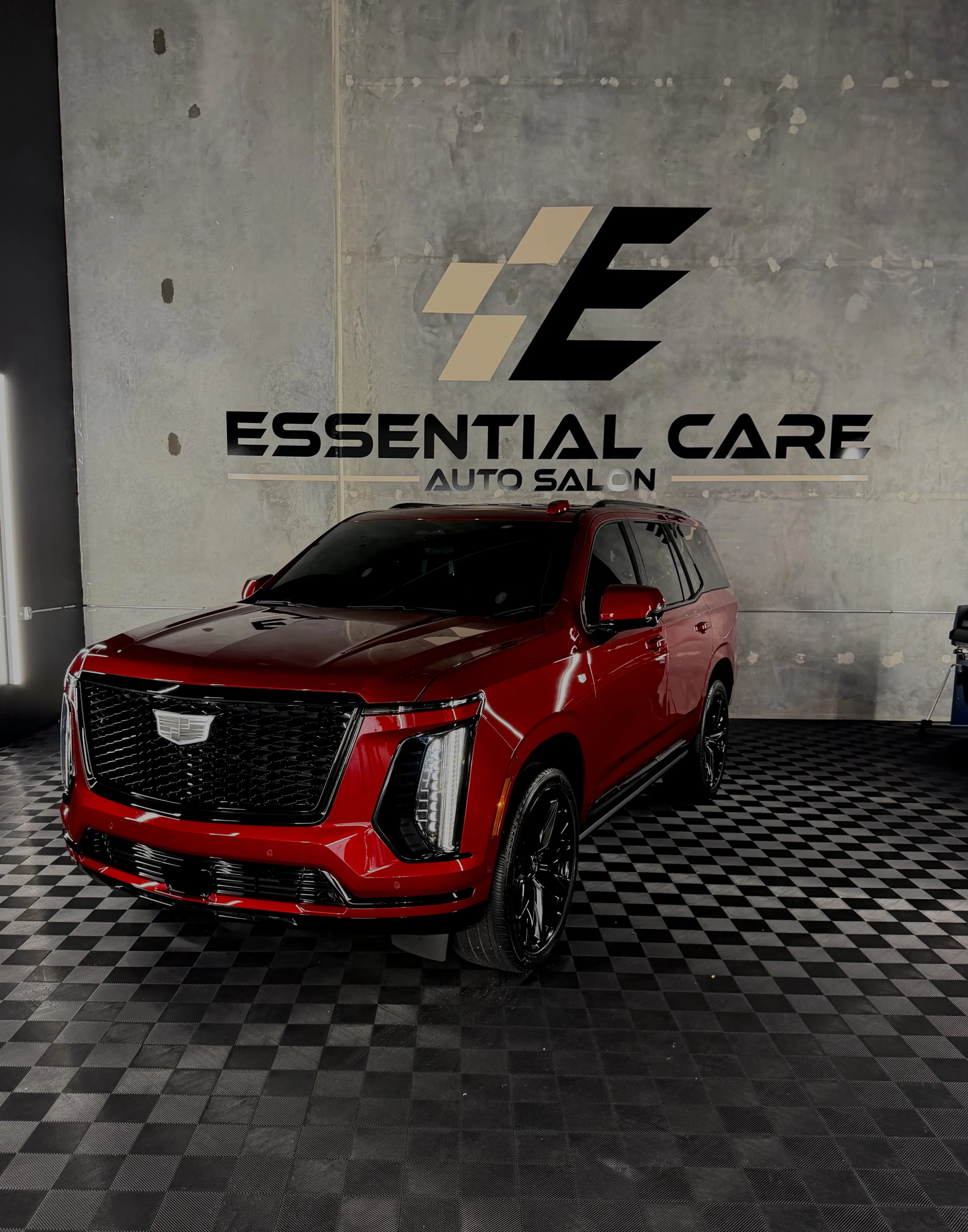 Essential Care Auto Salon shop with client vehicle