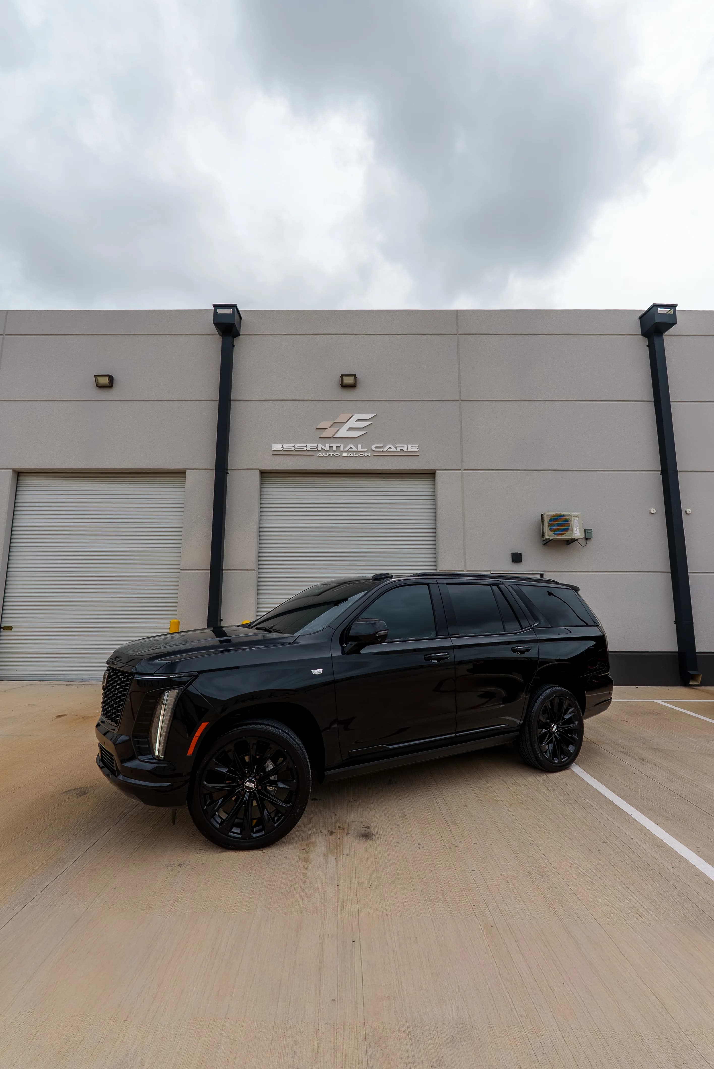 Window tint on a blacked-out Cadillac Escalade