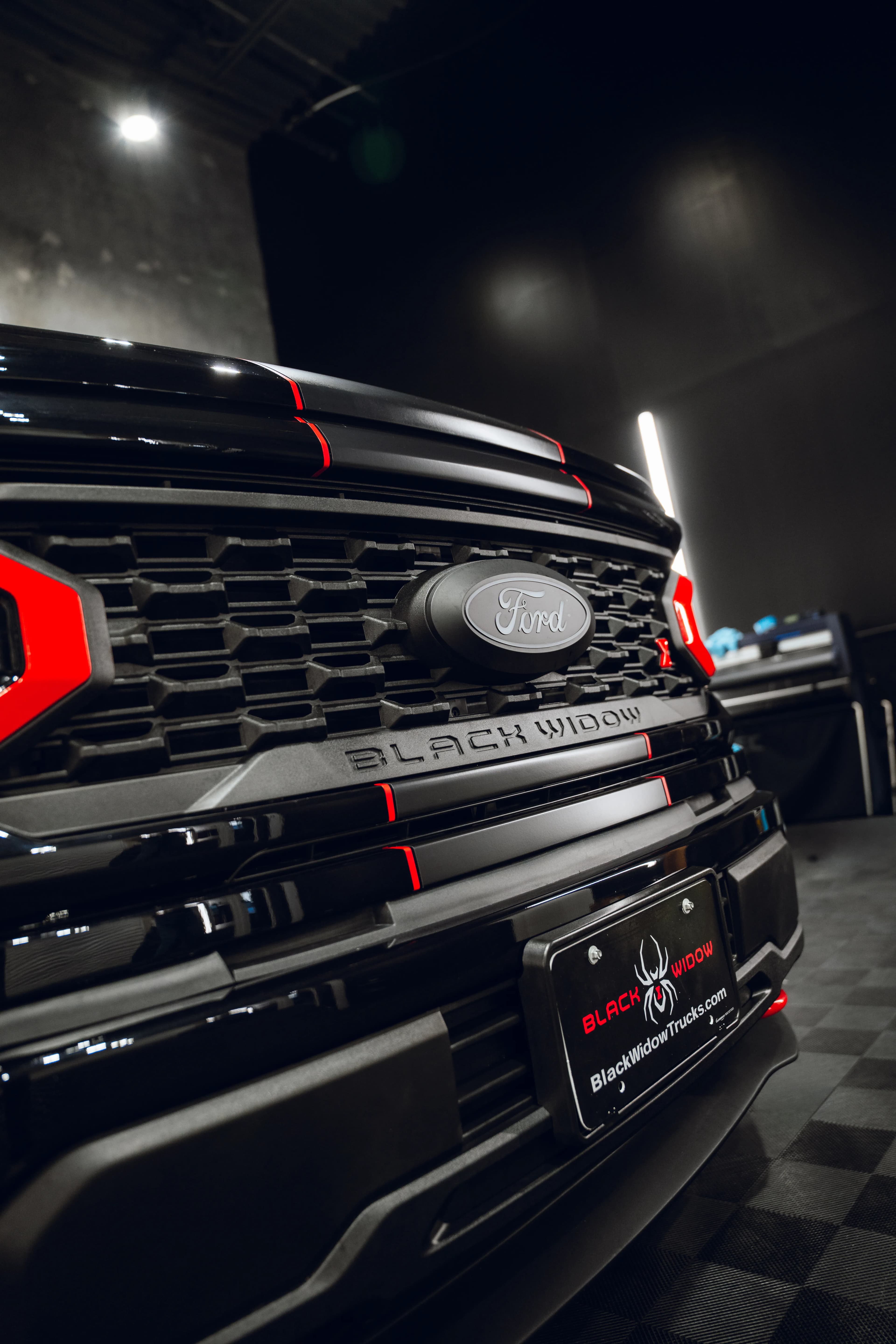 Black Widow Ford F-150 grille and badging detail