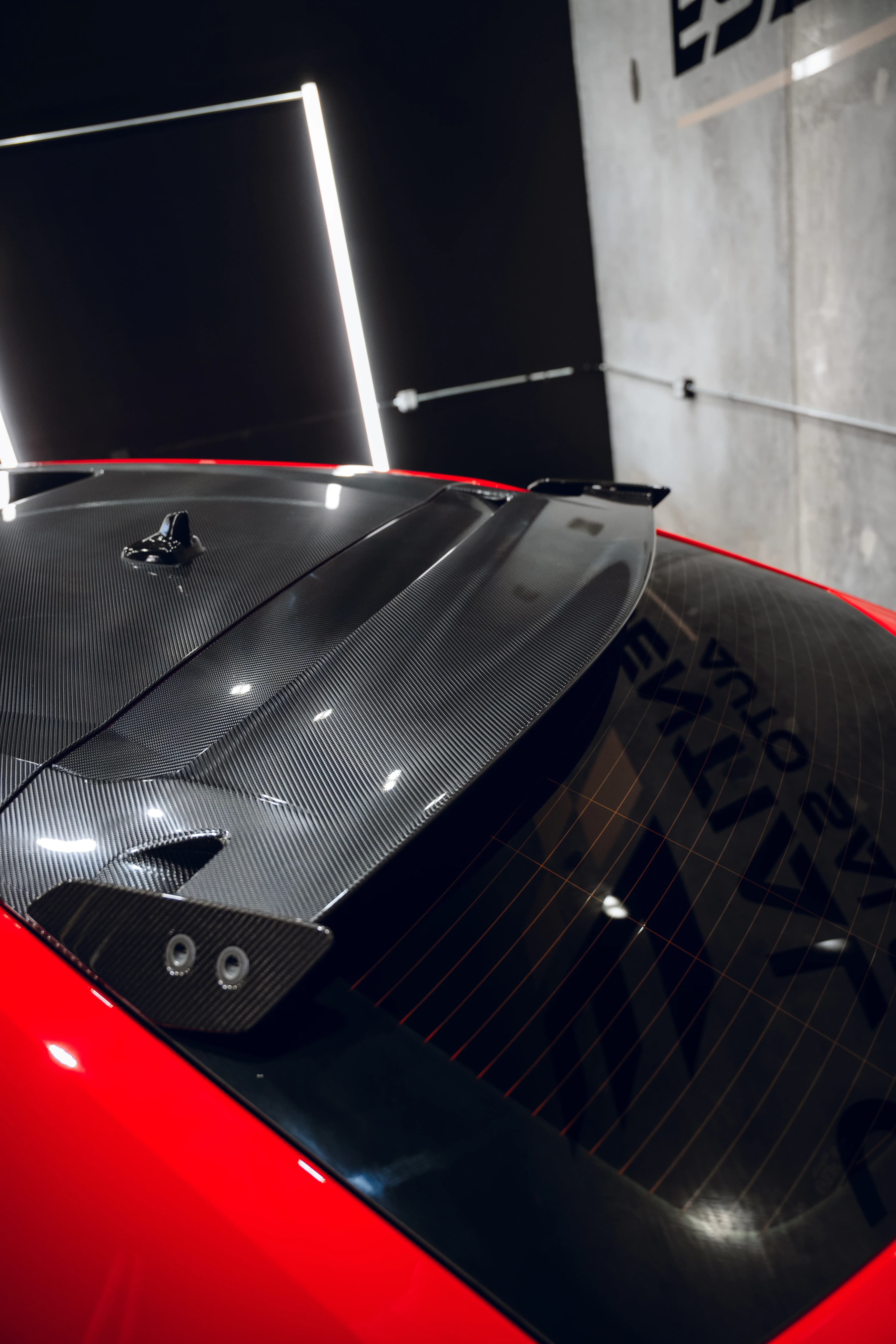 Red Lamborghini with a protected, high-gloss ceramic-coated finish